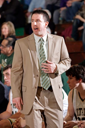 Boylan High School head coach Mike Winters talks to his team as they play Belvidere in the first quarter Tuesday, Jan. 31, 2012, during their game at Boylan in Rockford.