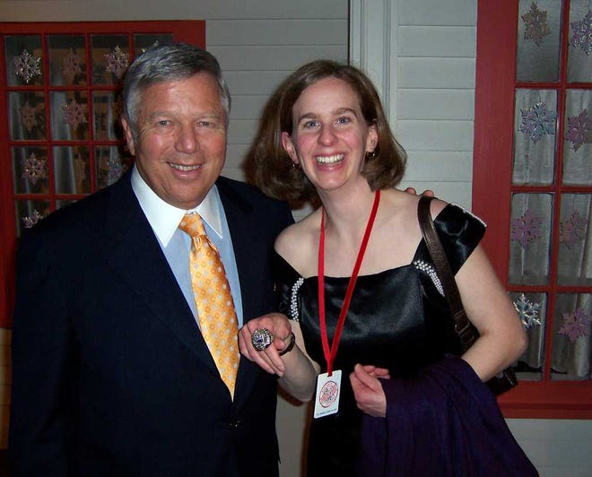 Stellino's daughter Tracy (above right) posing with Patriots owner Bob Kraft while wearing his replacement Super Bowl ring, needed because Vladimir Putin (right) walked off with Kraft's original.  Provided by Vito Stellino