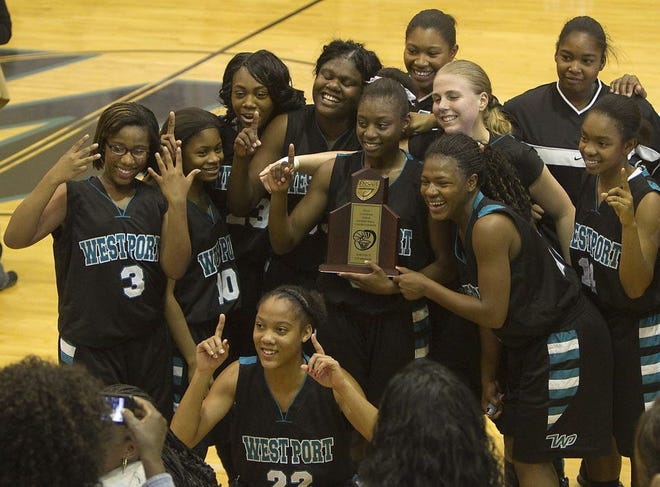 West Port players celebrate their district championship-winning win over Citrus on Friday in Ocala.