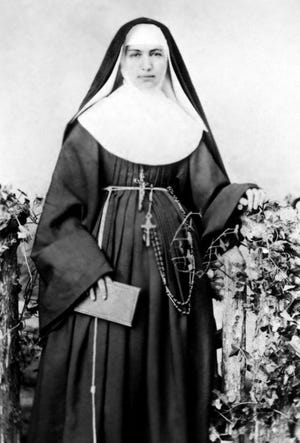 This 1883 file photo provided by the Sisters of St. Francis of the Neumann Communities shows Mother Marianne Cope, a nun who dedicated her life to caring for exiled leprosy patients in Hawaii. She will become a saint next year.