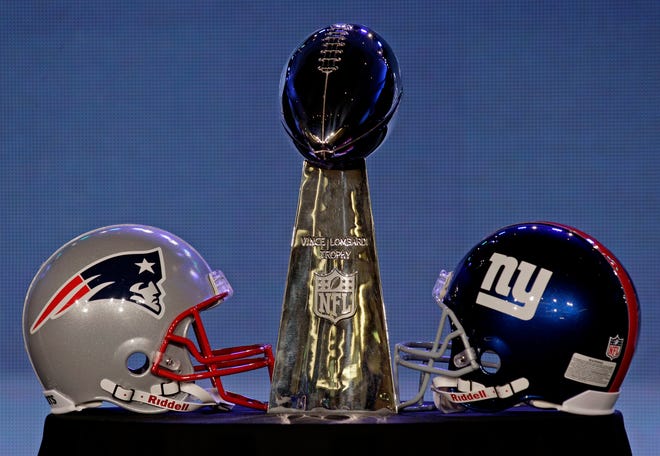 The Vince Lombardi Trophy is seen during a news conference for NFL football's Super Bowl XLVI Friday, Feb. 3, 2012, in Indianapolis. (AP Photo/David J. Phillip)