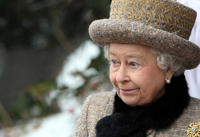 Britain's Queen Elizabeth II attends the church of St. Peter and St. Paul at West Newton, eastern England, Sunday. The queen braved the cold and snow to attend church Sunday on the eve of her Diamond Jubilee anniversary. The 85-year-old monarch marks 60 years on the throne on Monday. The anniversary will be marked by a series of regional, national and international events throughout 2012. Elizabeth ascended the throne when her father, George VI, died on Feb. 6, 1952. She is the longest-serving monarch after Queen Victoria, who reigned for more than 63 years. (AP Photo/PA, Chris Radburn) UNITED KINGDOM OUT NO SALES NO ARCHIVE