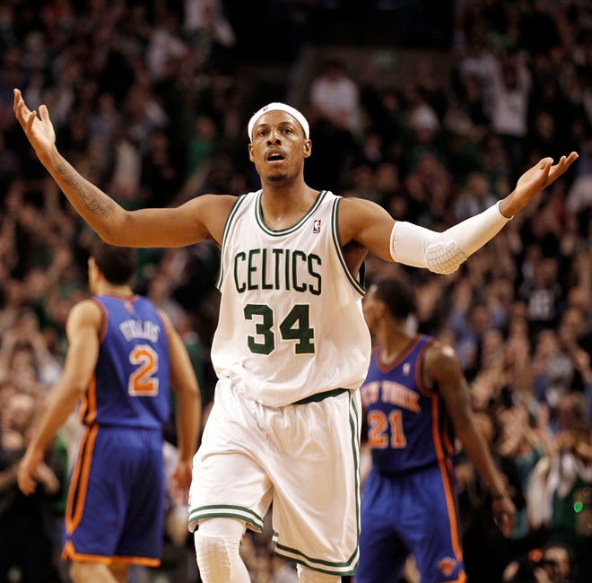 Boston Celtics' Paul Pierce celebrates during the second half of Boston's 91-89 win over the New York Knicks in an NBA basketball game in Boston Friday, Feb. 3, 2012. (AP Photo/Winslow Townson)