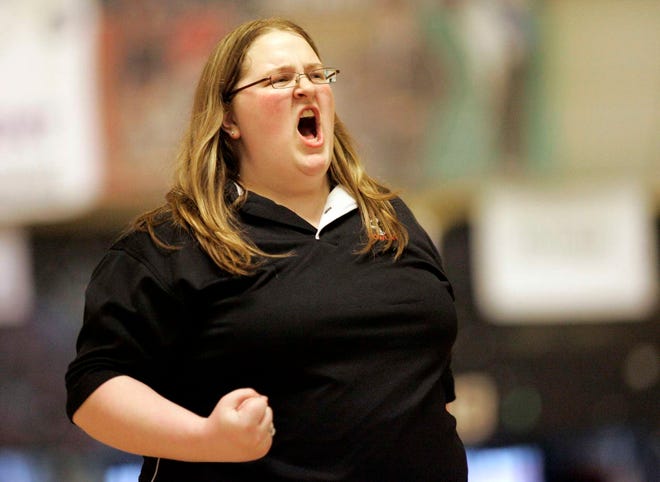 K'Lynn Lawver of Harlem High School celebrates after a strike Saturday, Feb. 12, 2011, during the Illinois High School Association girls state bowling championship at Cherry Bowl in Cherry Valley.