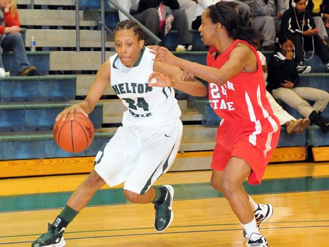 Shelton State's Alexsis Brown (24) drives past Gadsden State's Sheyenne Turner (24) during the second half.