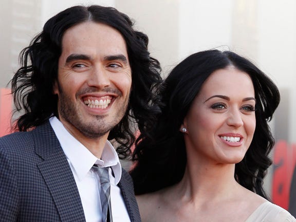 In this April 19, 2011 file photo, British actor Russell Brand and his wife Katy Perry arrive for the European premiere of "Arthur, " in London. A judge signed off on the couple's divorce Wednesday, but the pair will have to wait until July 14 until they are legally single again. Financial details of the split are confidential.