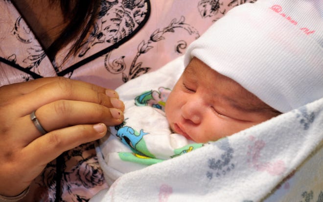 Aanya, the first baby born at 12:12AM New Year's Day at Saint Francis Medical Center.
