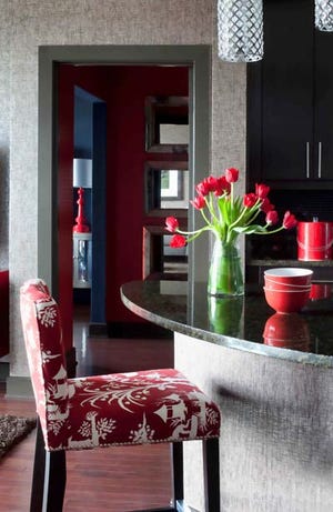 AP Photo/Brian Patrick Flynn Designs, William Brinson and Christina Wedge - When decorating spaces where dates are likely to start or end, Designer Brian Patrick Flynn suggests playing with reflective surfaces and passionate hues such as fire engine red.