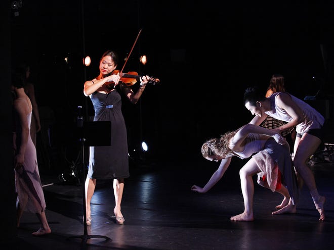 “Temptation of the Muses,” with violinist Angella Ahn standing left, will be performed by the Ahn Trio and the Nai-Ni Chen Dance Company at 7:30 tonight at the Phillips Center in Gainesville. (Courtesy of the Ahn Trio)