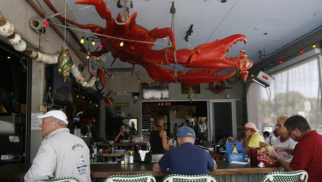 Patio bar at Johnny Longboats. (Palm Beach Post file photo)