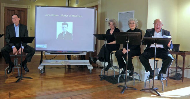 WIBW-TV news anchor Ralph Hipp, left, emcees a reader's theater presentation Feb. 5 of "John Brown: Martyr or Madman," with, from left, Phyllis Penney, Mary Kerle and Ken Kerle, at the Hale Ritchie House, 1118 S.E. Madison, where at 2 p.m. Sunday the script will be "The Underground Railroad."