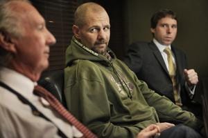 In this Journal Star file photo from Nov. 4, 2011, Kenny Meinders, center, listens to responses from his attorneys Dan Cusack, left, and Shaun Cusack at a news conference at Dan Cusack’s law office. Meinders was indicted by a Woodford County grand jury for his involvement in an August incident that left him hospitalized.