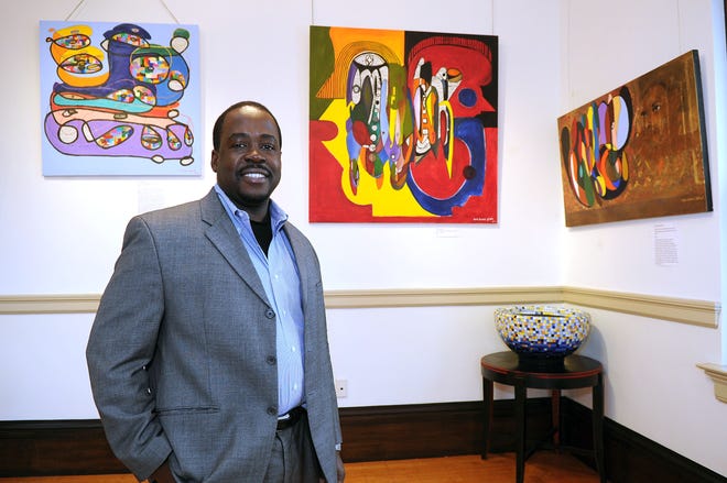 Brocktonian Duken Delpe has opened his first art exhibit at the Brockton Public Library at the library's Family Day reception in honor of Black History Month on Saturday.