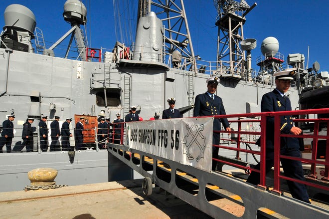 Naval officers from the Royal Moroccan Navy depart the guided-missile frigate USS Simpson (FFG 56) after receiving a tour of the bridge and training on combat systems operations. Simpson, homeported out of Mayport, Fla., is currently conducting theater security cooperation and maritime security operations in the U.S. 6th Fleet area of responsibility.