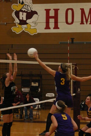 Sydney Shubert of Canton went high at the net to put over this return in the Lady Giants' championship game match against the Havana Lady Ducks Wednesday night. Coach Amber Alexander's club controlled the action on both sides of the net in winning the title 25-11, 25-10 over the hosts.