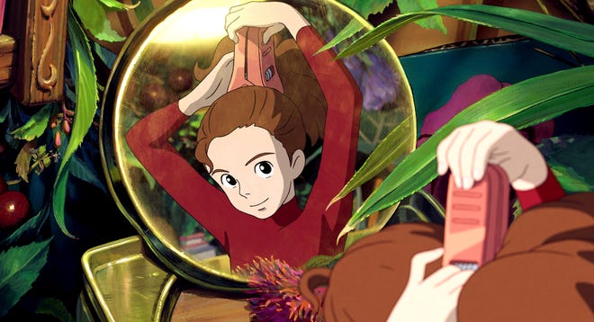 The character Arrietty, voiced by Bridgit Mender, is shown in a scene from the animated feature, "The Secret World of Arrietty."