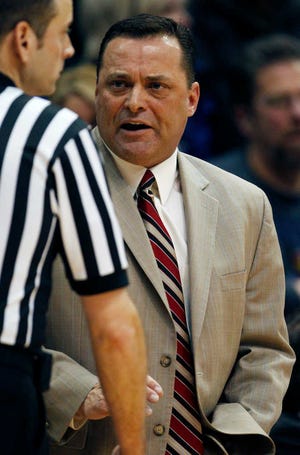 Texas Tech coach Billy Gillispie speaks to an official during the first half of an NCAA college basketball game against Kansas in Lawrence, Kan., Saturday, Feb. 18, 2012. (AP Photo/Orlin Wagner)