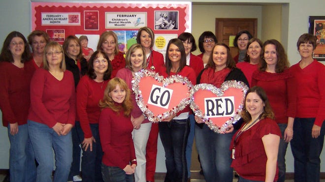 Health Department clients and patients were welcomed by Department staff
members wearing red attire on Friday, February 3rd. The staff participated
in National Wear/Go Red Day. The health designation is a special day during
February - American Heart Month that focuses attention and awareness of
women's heart health. Heart disease is the number one killer of both men
and women in the US. For more information on the heart health services
offered by the Health Department visit their website
www.henrystarkhealth.com