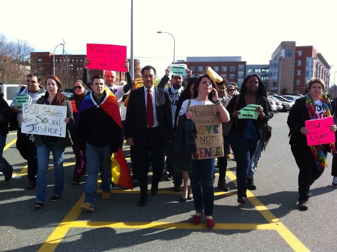 Bridgewater State University President Dana Mohler-Faria leads hundreds of marchers as they show their support for free speech Tuesday morning in a walk across campus.