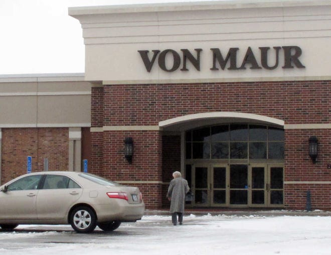 A shopper arrives at the Von Maur store at Sycamore Mall in Iowa City, Iowa. The company's decision to move the store five miles to Coralville, Iowa, which promised an incentives package worth more than $11 million, has infuriated Iowa City leaders and led to a debate over the use of subsidies for economic development.
