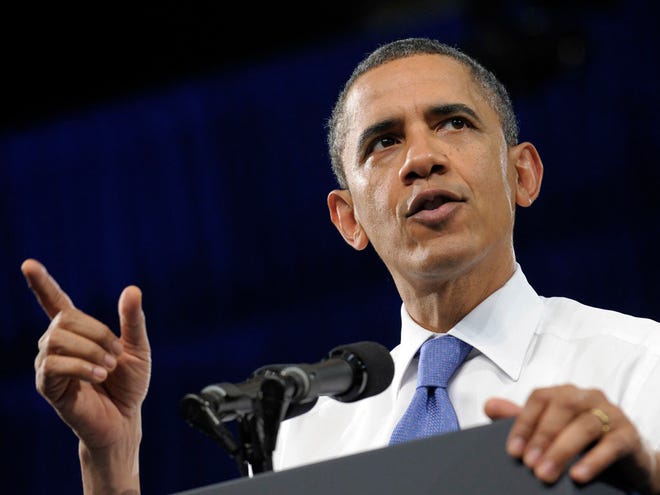 President Barack Obama speaks at the University of Miami Field House in Coral Gables, Fla., Thursday, Feb. 23, 2012. (AP)