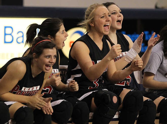 Whitharral players react during the final moments of their win over Nazareth in their Class 1A Division II regional semifinal game on Friday at the Texan Dome in Levelland. (Zach Long)