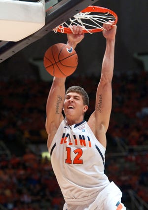 Illinois' Meyers Leonard dunks against Iowa during the first half of an NCAA college basketball game in Champaign, Ill., Sunday, Feb. 26, 2012.