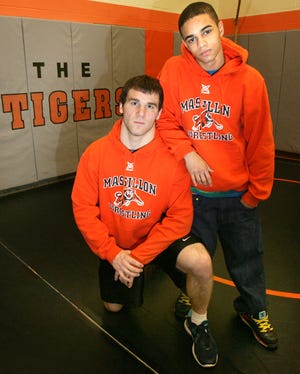 State bound Massillon wrestlers Lane Louive (kneeling) and Ivan McClay.