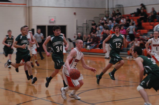 Rudyard's Lukas Steikar drives to the basket during Tuesday night's game against Cedarville.