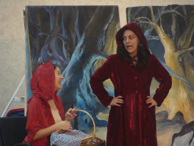 Linden Christ, as Red Riding Hood’s mother, tells Bryna Berezowska of the trip she’s getting ready to take to get to her grandmother’s house.