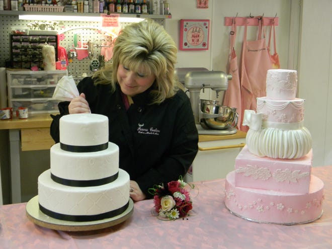 Suella Kuenzl, owner of Princess Creations - Cakes, Mints, and More, puts special touches on a cake at her business which is located in Fairview. Kuenzl has been decorating cakes for more than 20 years, but founded her business just three years ago. Located at 785 S. Street in Fairview, Kuenzl may be reached at 309-778-2133 or by visiting her website at princesscreationscakes.com