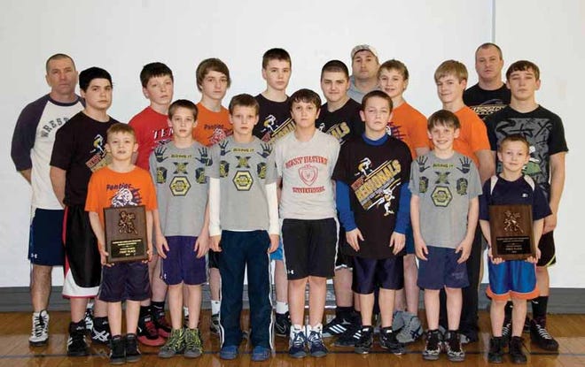 Pictured are members of the Pontiac Wrestling Club that won a regional title last weekend at Tolono. Making up the team include, in front from left, Kristian Wiles, Payton Pulliam, Marcus Long, Tyler Lanning, Billy Burns, Tyler Pulliam and Drew Burns. In back are coach Tom Lind, Blade Fellers, Levi Ransom, Ryan Railey, Jacob Larkin, Hunter Bowles, coach Jerry Lanning, Jake Lanning, Kevin Gschwendtner, coach Jason Long and Vaughn Hobart.