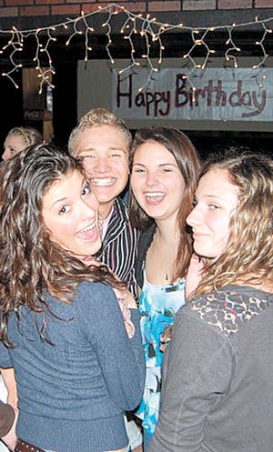 Seth Reid is surrounded by friends at his birthday party.