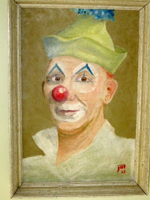 Al Frederick portrayed himself as a clown when he painted a self-portrait 49 years ago. It hangs in the home of his daughter, Suellen Frederick.