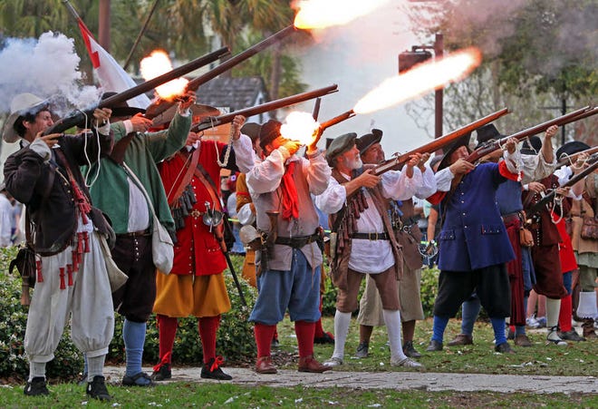 Spanish militia fires at English privateers during the annual reenactment of Captain Robert Searle's 1668 raid of St. Augustine in the Plaza de La Constitucion on Saturday evening, March 3, 2012. BY DARON DEAN, daron.dean@staugustine.com