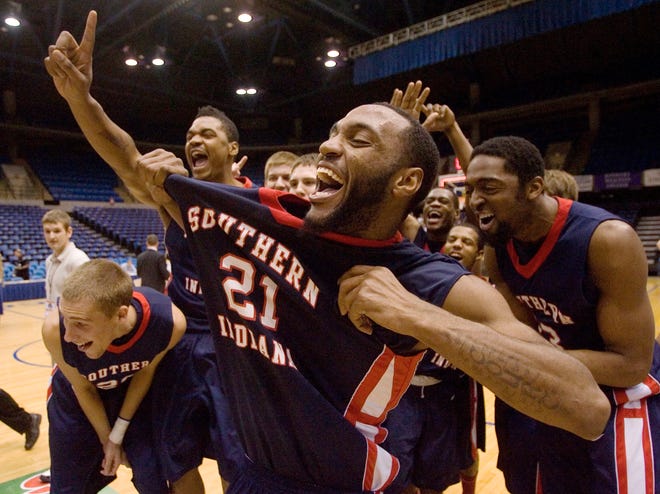 Southern Indiana's Isaac McClure celebrates after defeating Northern Kentucky 60-56 Sunday March 4, 2012 during the Great Lakes Valley Conference Men's Basketball Championship Sunday, March 4, 2012 at the Prairie Capital Convention Center in Springfield, Il.