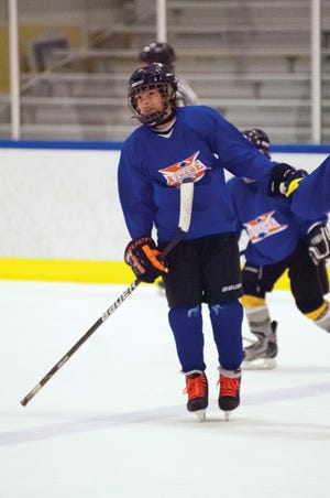 Nick Thompson skates around during a warm-up in a Rochester Xtreme Hockey League game last season. The league has grown to over 500 players and is open to players ages 5-to-18.