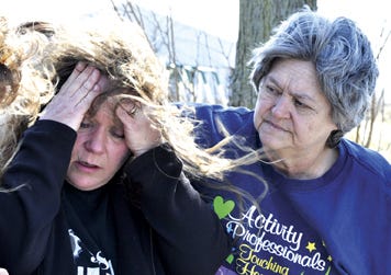 Lisa Payton was distraught about her family’s predicament after a fire broke out in their leased home near Chenoa Tuesday. She received comfort from her mother-in-law, Melba Payton of Pontiac.