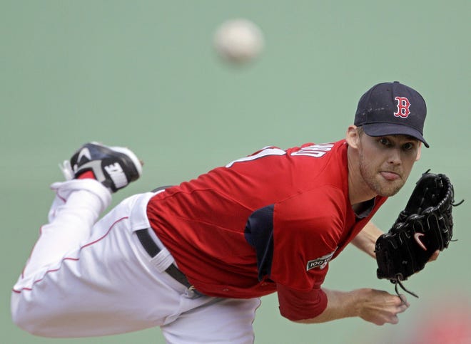 The Red Sox’s Daniel Bard pitches Tuesday during the first inning of a spring training game against the Orioles in Fort Myers, Fla. Bard threw two scoreless innings for Boston.