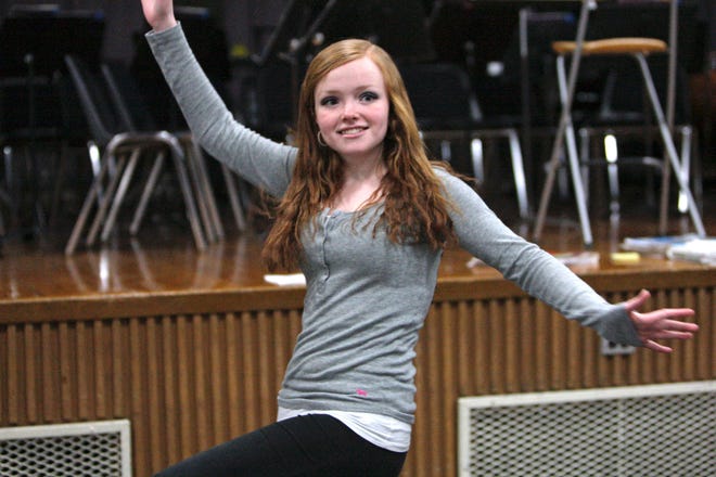 Vicky Lynch, 16, playing Lily St. Regis in "Annie," practices one of the musical numbers she will perform with the characters Rooster and Miss Hannigan in Abington High School on Wednesday, Feb. 29, 2012. The show is running March 8 and 9 at 7:30 p.m. and March 10 at 2 p.m. in the Frolio Auditorium at the high school.