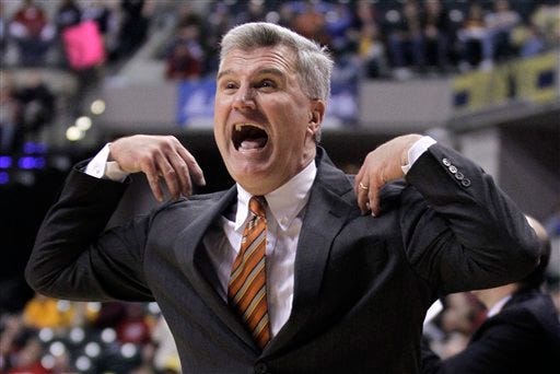 Illinois head coach Bruce Weber reacts in the second half of an NCAA college basketball game against Iowa at the first round of the Big Ten Conference tournament in Indianapolis, Thursday, March 8, 2012. Iowa won 64-61. (AP Photo/Michael Conroy)