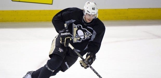 Pittsburgh Penguins Sidney Crosby is still recovering from a concussion and neck injury that have sidelined him for most of the season. The Penguins star ruled himself out for Sunday's game against Boston but is optimistic he could play for the first time since early December when the team travels to play the Eastern Conference-leading New York Rangers on Thursday.