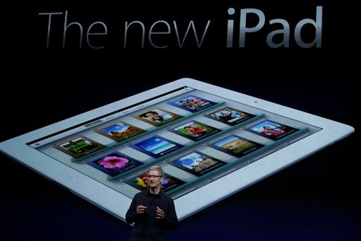 Apple CEO Tim Cook announces a new iPad during an Apple press conference Wednesday in San Francisco.