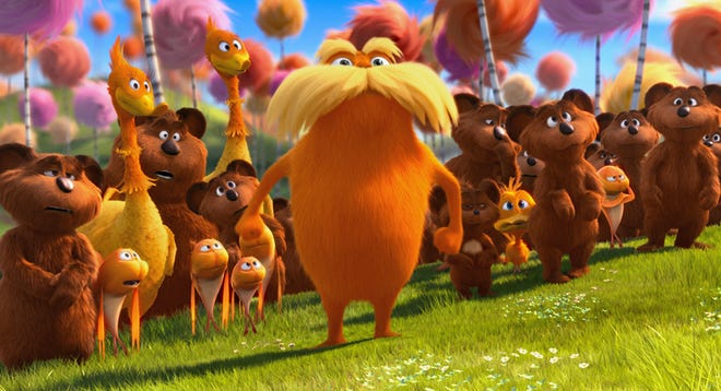 The Lorax (DANNY DEVITO) stands with the Bar-ba-loots, Swomee-Swans and Humming-Fish in "Dr. Seuss' The Lorax", a 3D-CG adventure from the creators of "Despicable Me" and the imagination of Dr. Seuss.