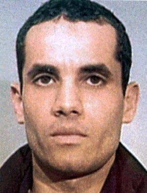 In this undated police handout file photo, Algerian Ahmed Ressam is pictured. Ressam was arrested near the U.S.-Canadian border and convicted of plotting to bomb Los Angeles International Airport at the turn of the millennium. A federal appeals court has overturned the 22-year sentence for Ressam, the convicted "millennium bomber", calling it unreasonably lenient. The 9th U.S. Circuit Court of Appeal ruled 7-4 in favor of the government's appeal in a decision released Monday March 12,2012. (AP Photo/Canadian Press, Police Handout via Le Journal de Montreal,File)