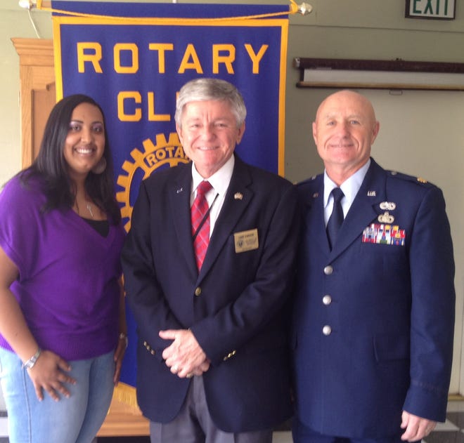 Pictured is Rotary President Allison B. Hudson, Secretary Carson, and Rotarian Major Donald Bailey