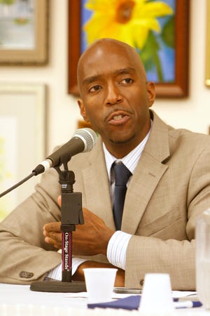 Councilor-at-large Jass Stewart, running for re-election, talks about city issues with the four other candidates at the Mary Cruise Kennedy Senior Center in Brockton on Wednesday, Oct. 19, 2011.