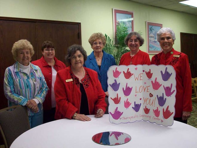 TLC party: Members of the Pilot Club of St. Augustine hosted a Valentine party for the children at the Therapeutic Learning Center. Cup cakes and punch were served, and a sing-along was enjoyed. Pictured from left Pilots: Jeanette Smith, Cheryl Bell, president-elect; Rose Ponder, who heads up the hosting community service committee; Lucille Barnhill, Jo Ellen Coleman and Kay Burtin. Support of TLC is an ongoing project for the club. As a thank you for the party, the children presented the Pilots with a card carrying impressions of their hands spelling "I Love You" in American Sign Language. Contributed photo.