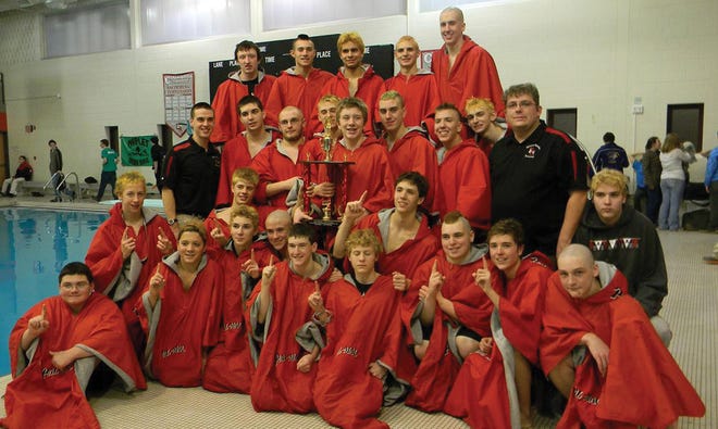 The Palmyra-Macedon swimming and diving team celebrates the school's first-ever Finger Lakes Invitational championship, which capped off the season after finishing in a three-way tie for the regular season title with Geneva and Newark.