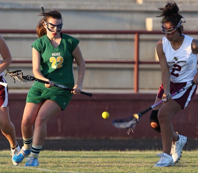 Nease's Charlotte Payne battles for the ball with St. Augustine's Dani DeLeon during Tuesday's game.